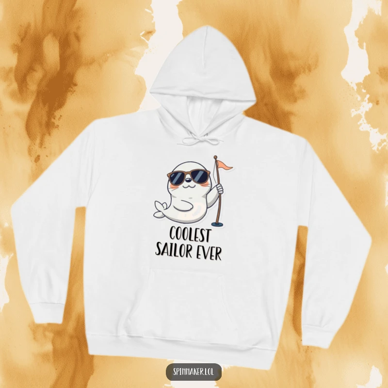 Funny seal hoodie featuring a playful character in sunglasses happily adjusting a sail, offering cozy nautical vibes and a touch of humor.