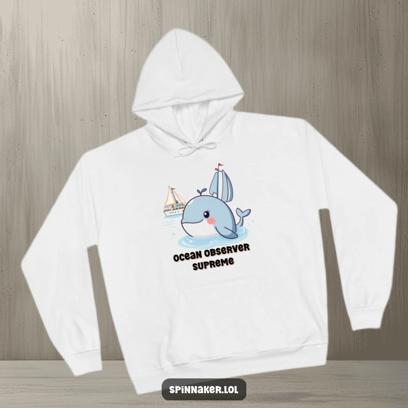 Funny whale hoodie featuring a curious whale watching a yacht from the water, conveying humorous observation and a love for marine life.